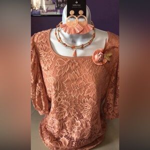 Adult small peach sleeved blouse with matching necklace and earrings